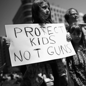 Protest sign: Protect Kids, Not Guns