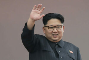 North Korean leader Kim Jong Un waves at parade participants in Pyongyang, North Korea, in 2016.