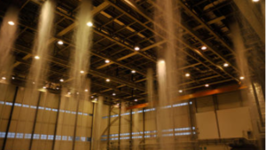 Poisonous foam fills the hangar at Ramstein Air Base, Germany during a biennial fire suppression system test, Feb. 19, 2015