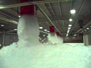Ellsworth Air Force Base in South Dakota tests out its aqueous film-forming foam sprinkler system in an airport hangar.