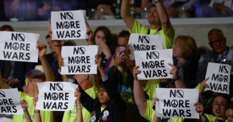 no more wars protest signs