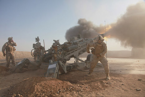 firing cannons in a desert