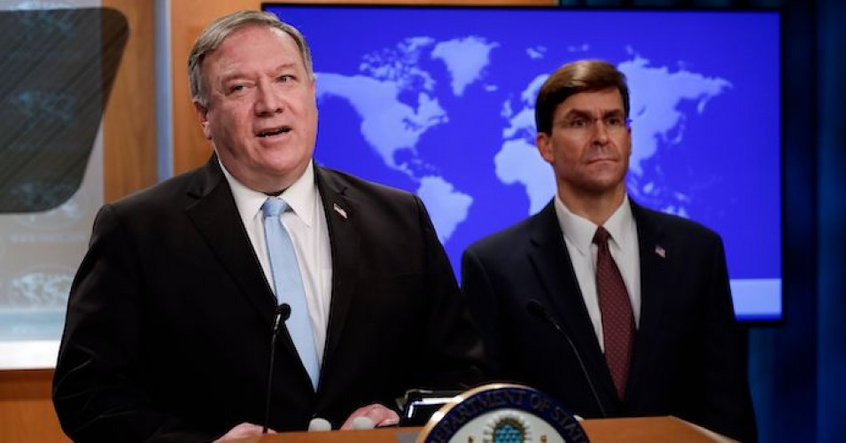Secretary of State Mike Pompeo (R) holds a joint news conference on the International Criminal Court with Defense Secretary Mark Esper (R), at the State Department in Washington, DC, on June 11, 2020. President Donald Trump on Thursday ordered sanctions against any official at the International Criminal Court who prosecutes U.S. troops as the tribunal looks at alleged war crimes in Afghanistan. 