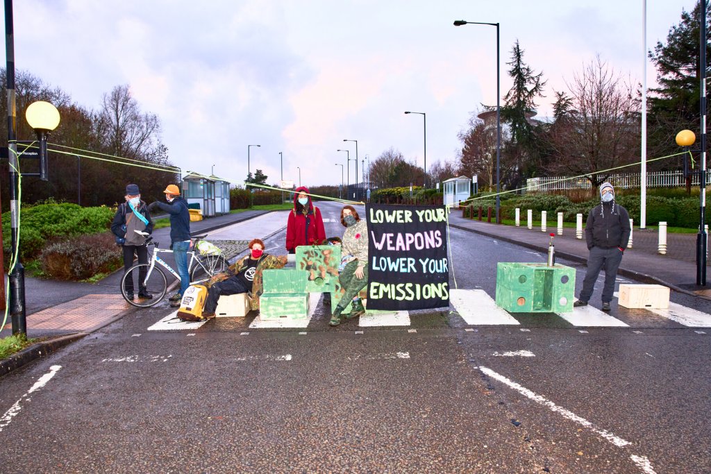 Activists from Extinction Rebellion block roads around the MOD in Filton, Bristol