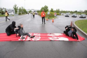 Blood on your hands - protest at CANSEC