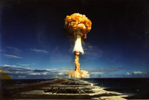 nuclear explosion with tall mushroom cloud