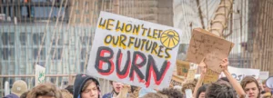 protest sign - we won't let our futures burn