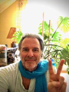 Chapter coordinator John Miksad wears a blue peace scarf