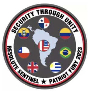 Resolute Sentinel military badge with a symbol of Peru and words "Security Through Unity, Resolute Sentinel, Patriot Fury 2023"
