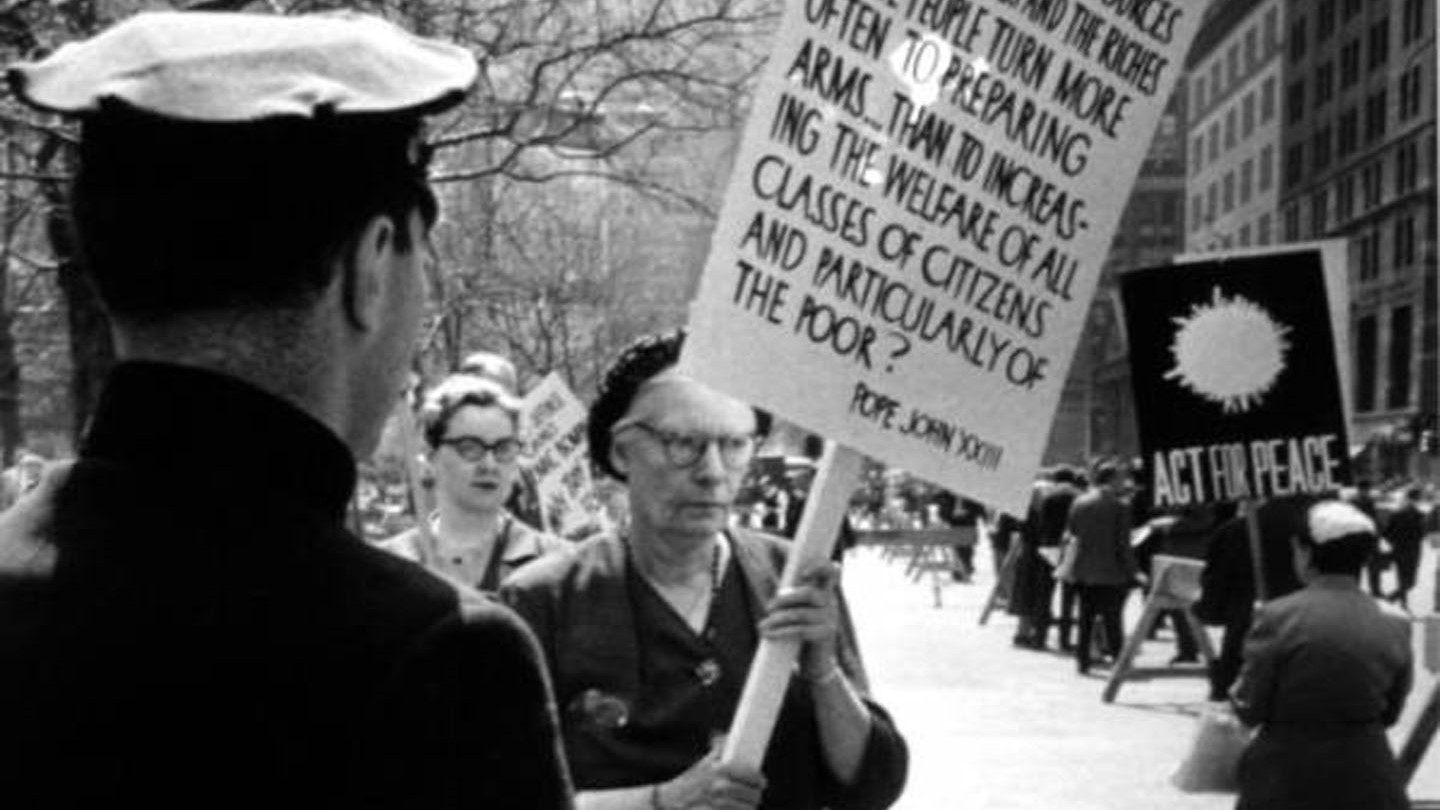 Dorothy Day and others protesting outside City Hall in New York City