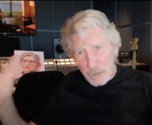 Roger Waters speaking at World BEYOND War Abolisher 2025 event, with picture of Francesca Albanese