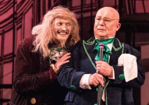 Two creepy looking pantaloon characters from the opera "The Barber of Seville"